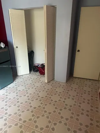 a bedroom with a bed