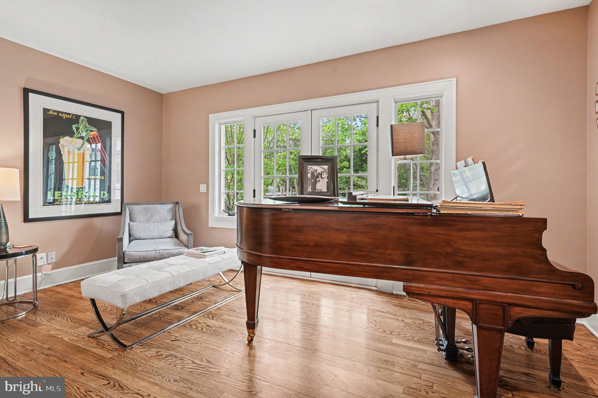 2723 Mill Road Doylestown, PA 18902 - Photo 15 of 39 a living room with a table chairs and a window