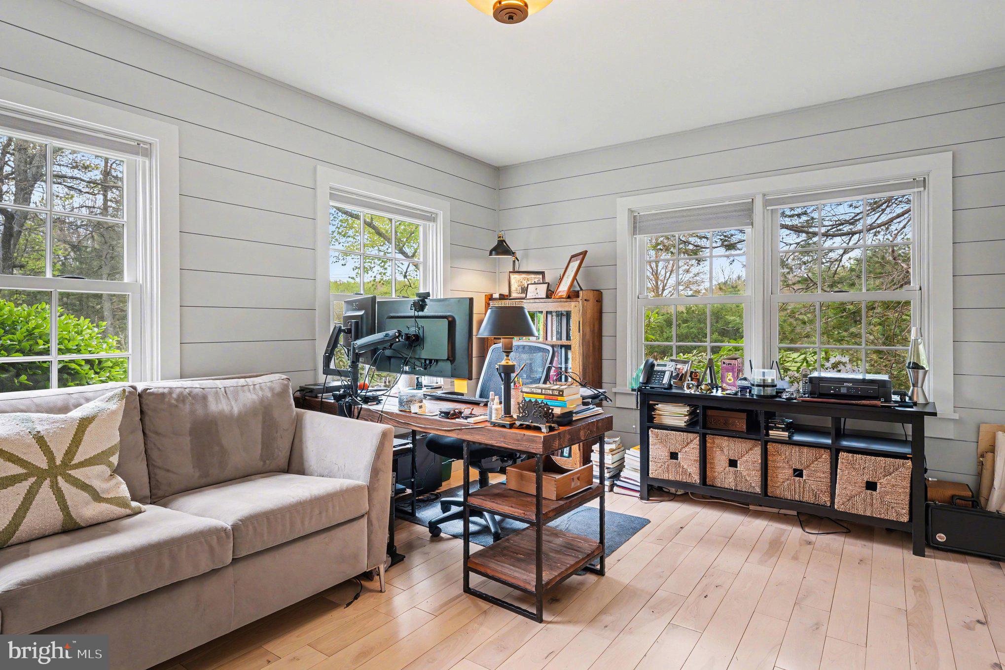 2723 Mill Road Doylestown, PA 18902 - Photo 22 of 39 a living room with furniture and a large window