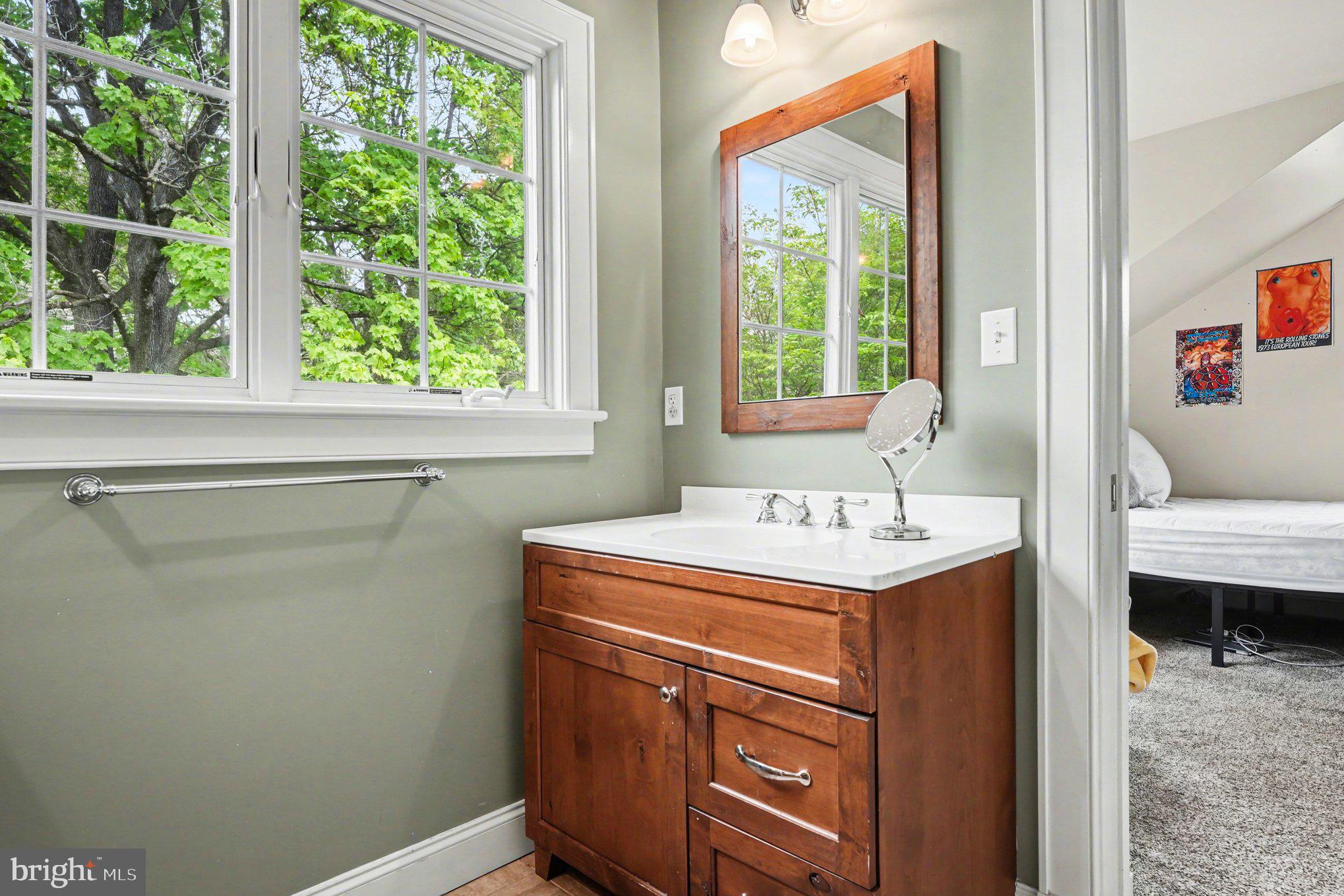 2723 Mill Road Doylestown, PA 18902 - Photo 27 of 39 a bathroom with a sink and a window