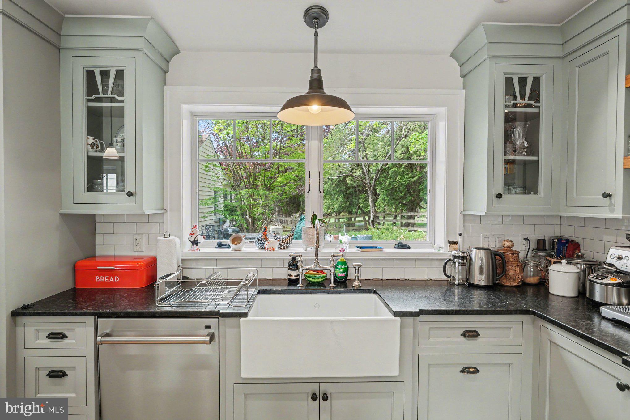 2723 Mill Road Doylestown, PA 18902 - Photo 5 of 39 a kitchen with stainless steel appliances a sink window and cabinets