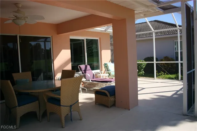 a view of a house and a dining room with balcony