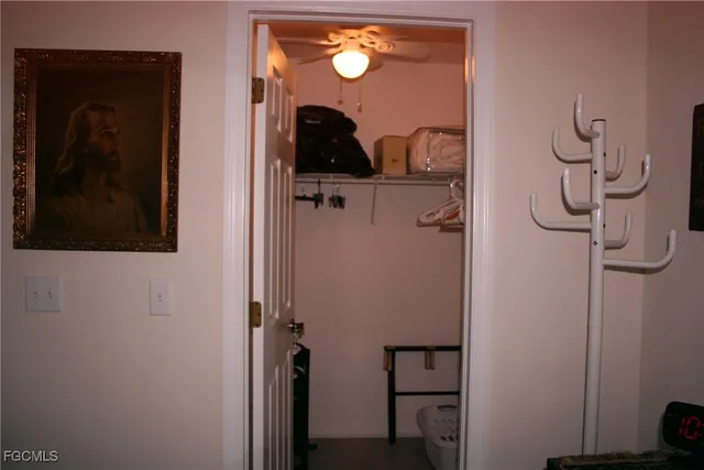 a bathroom with a mirror and a shower