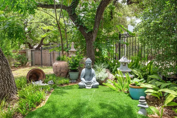 a view of a backyard with a small pool