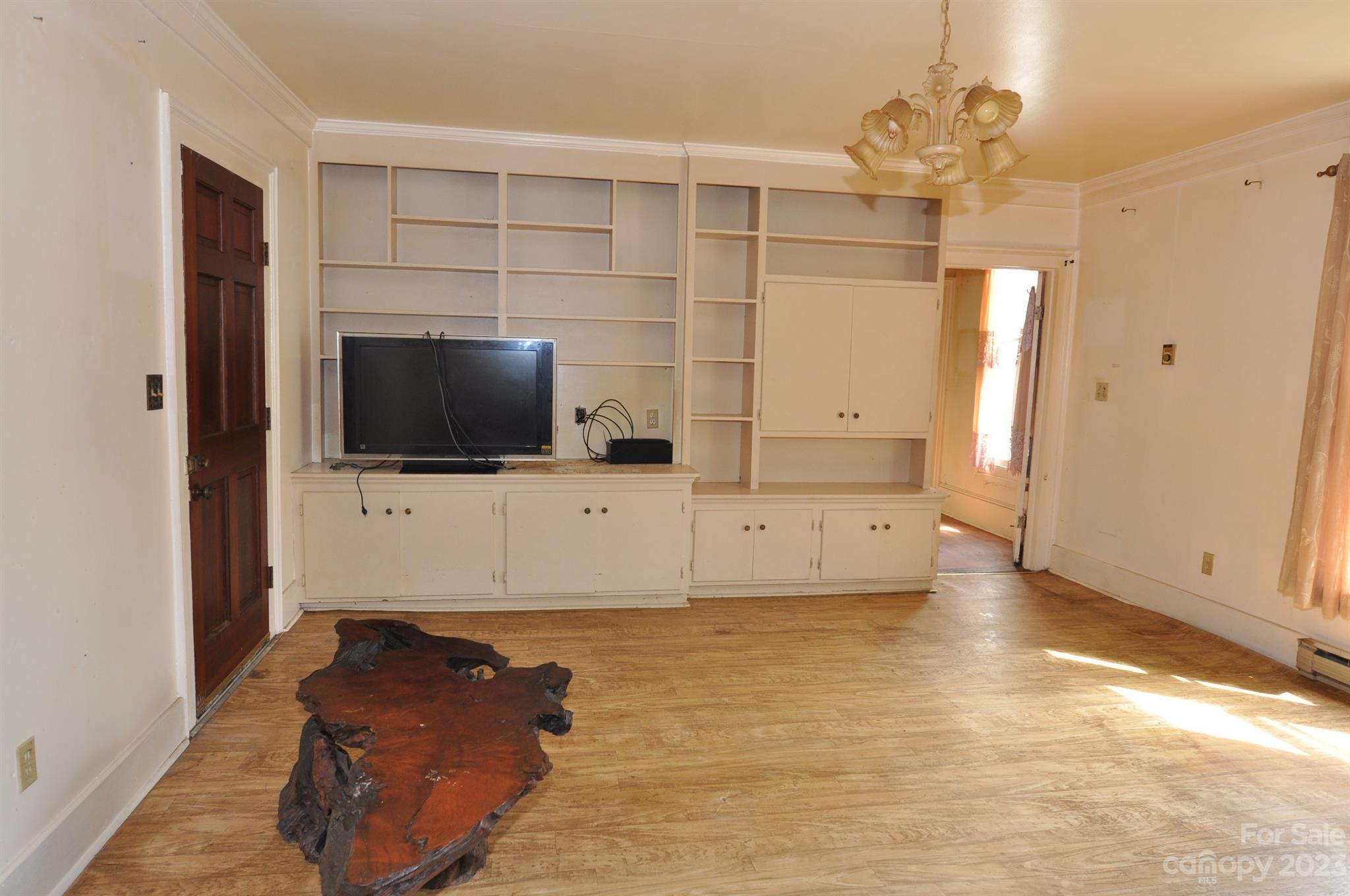 160 York Street Chester, SC 29706 - Photo 11 of 34 a living room with furniture and a flat screen tv
