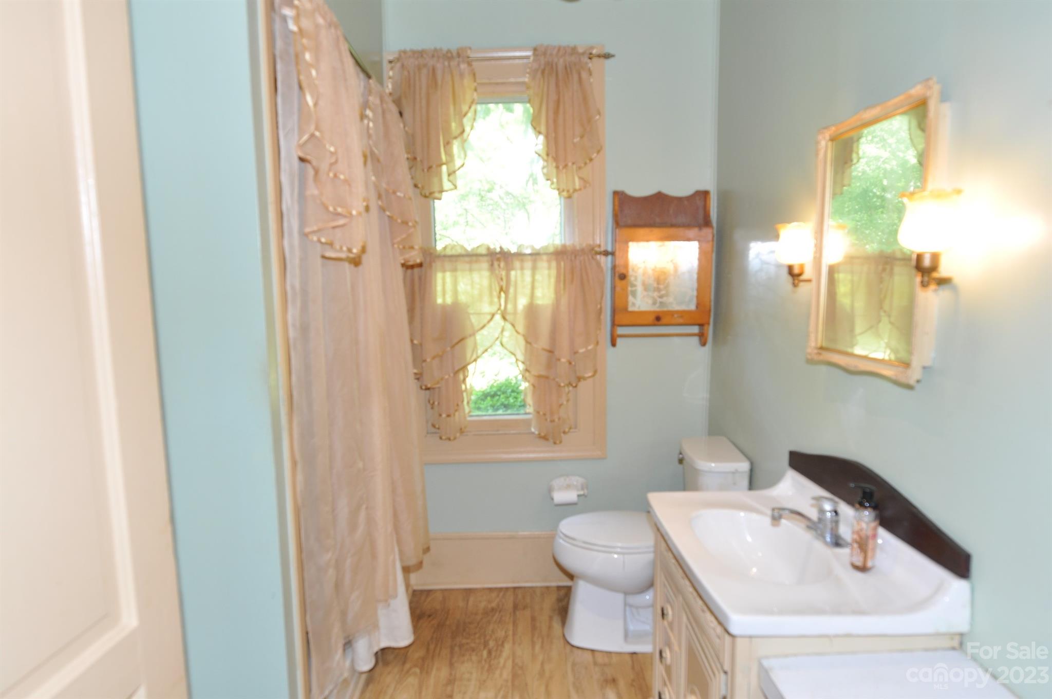 160 York Street Chester, SC 29706 - Photo 12 of 34 a bathroom with a sink and a toilet