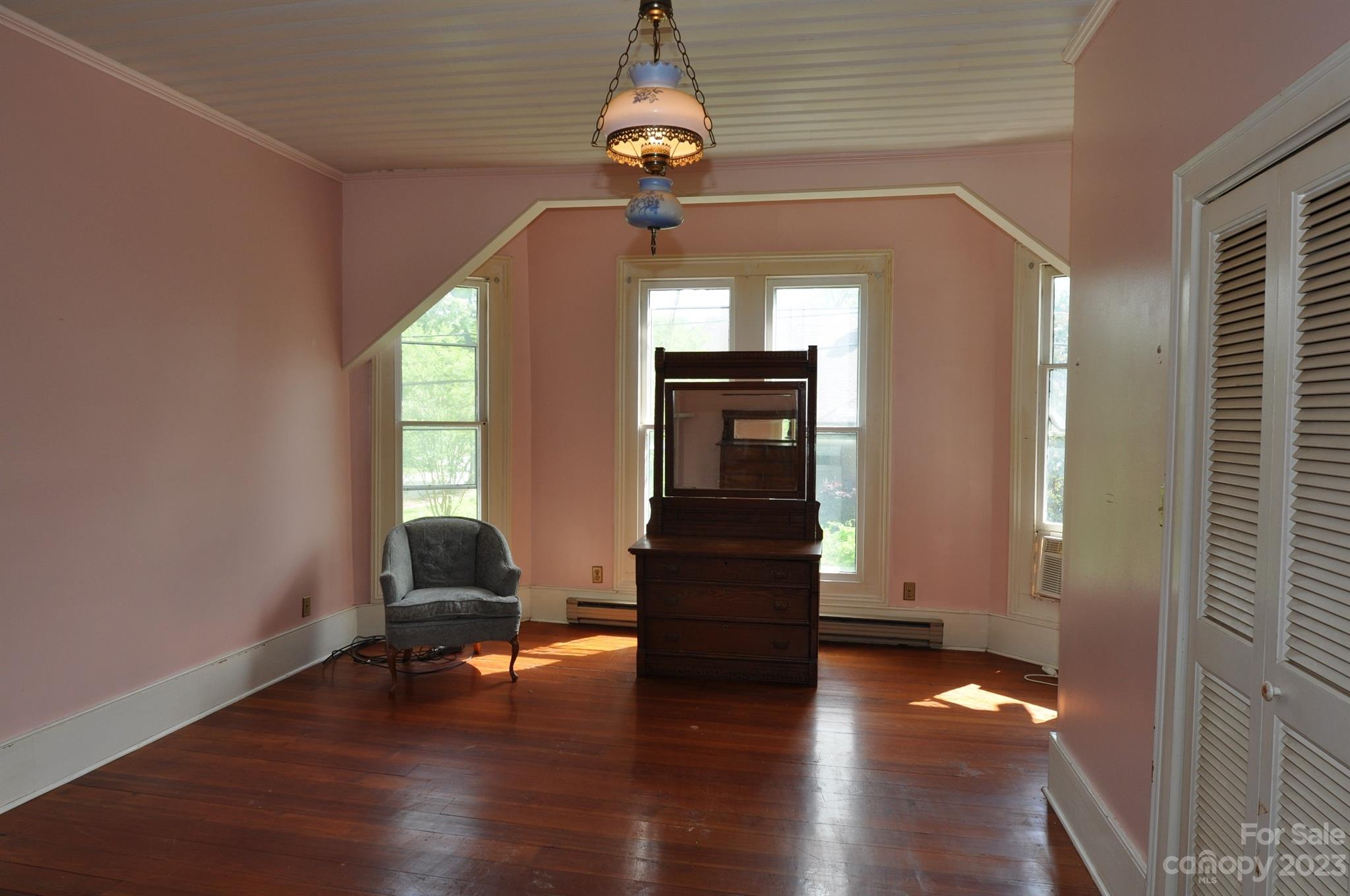160 York Street Chester, SC 29706 - Photo 14 of 34 a view of empty room with wooden floor and windows