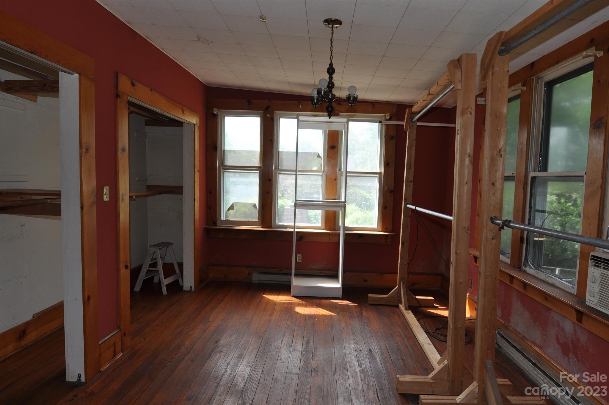 160 York Street Chester, SC 29706 - Photo 16 of 34 a view of a room with wooden floor and windows