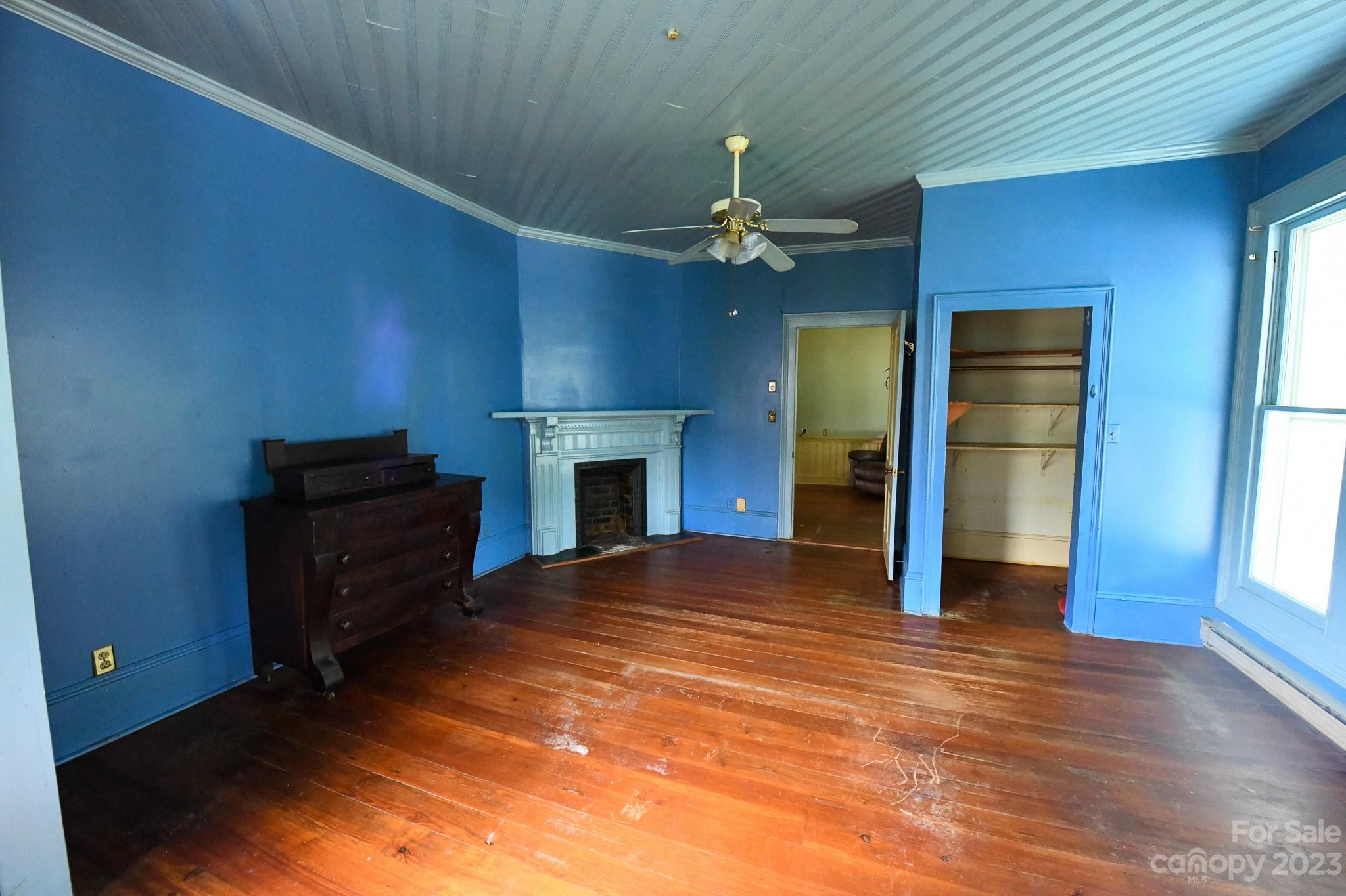 160 York Street Chester, SC 29706 - Photo 19 of 34 a view of an empty room with a fireplace and a window