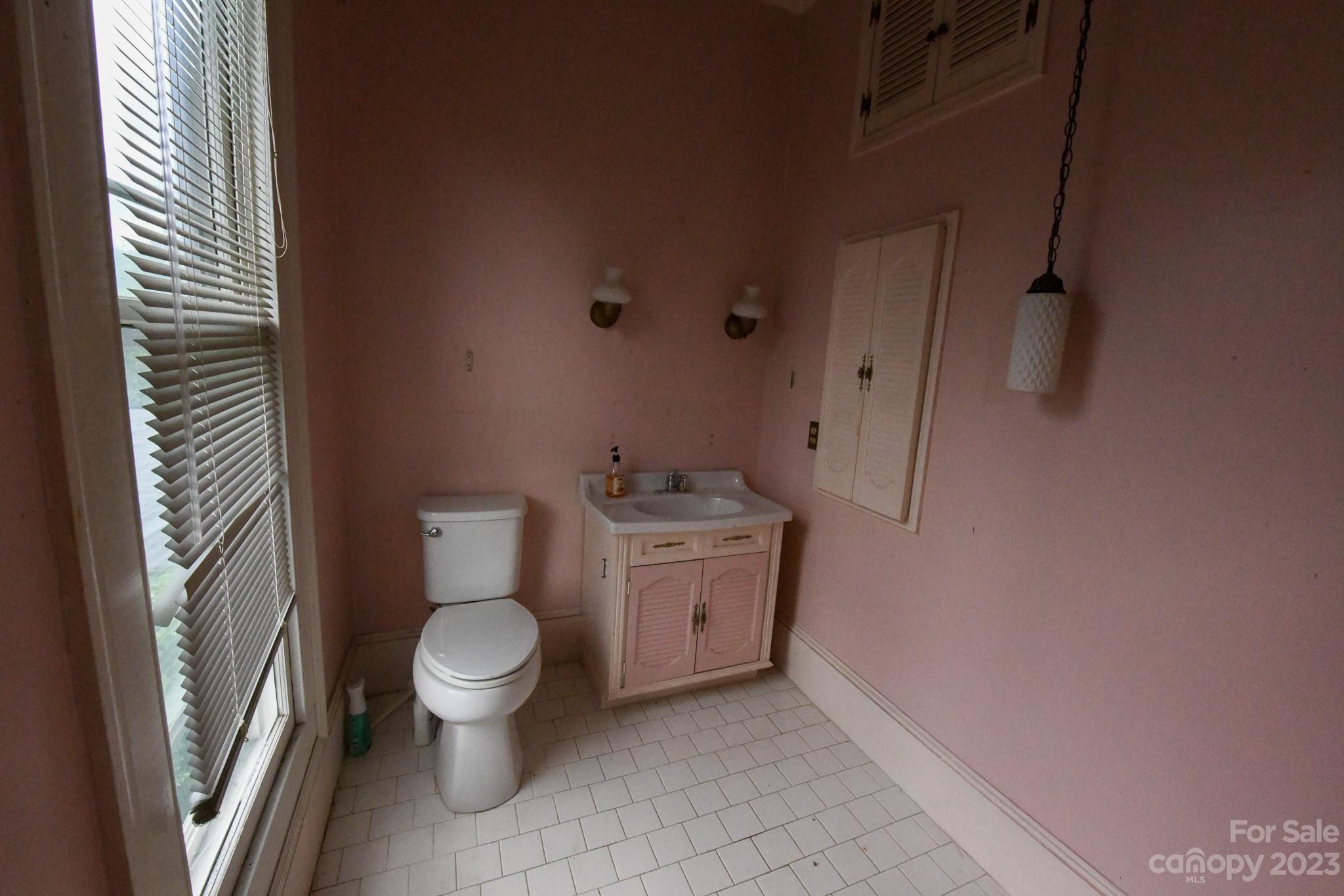 160 York Street Chester, SC 29706 - Photo 21 of 34 a bathroom with a toilet and a sink