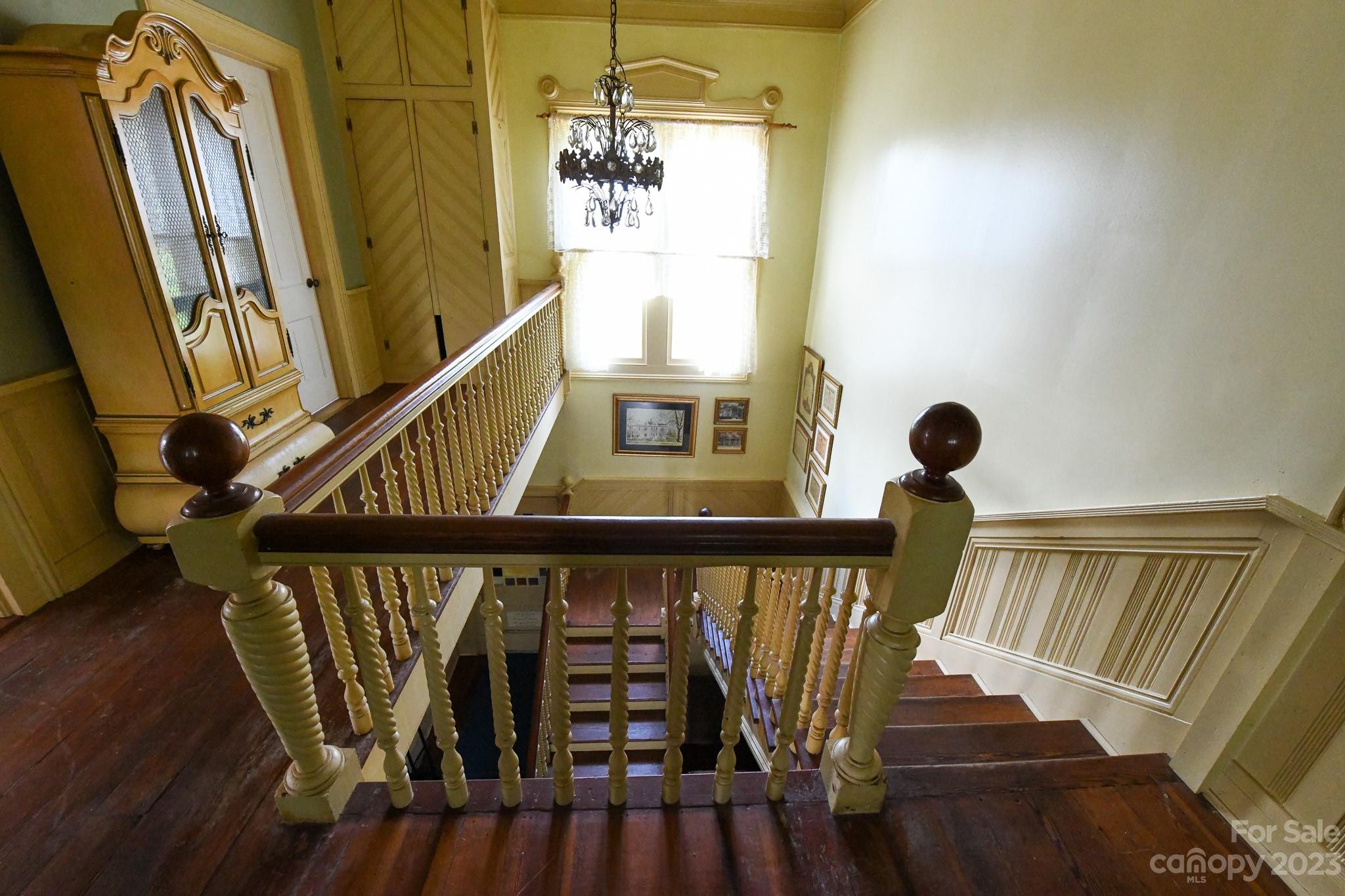 160 York Street Chester, SC 29706 - Photo 25 of 34 a view of stairs and with wooden floor