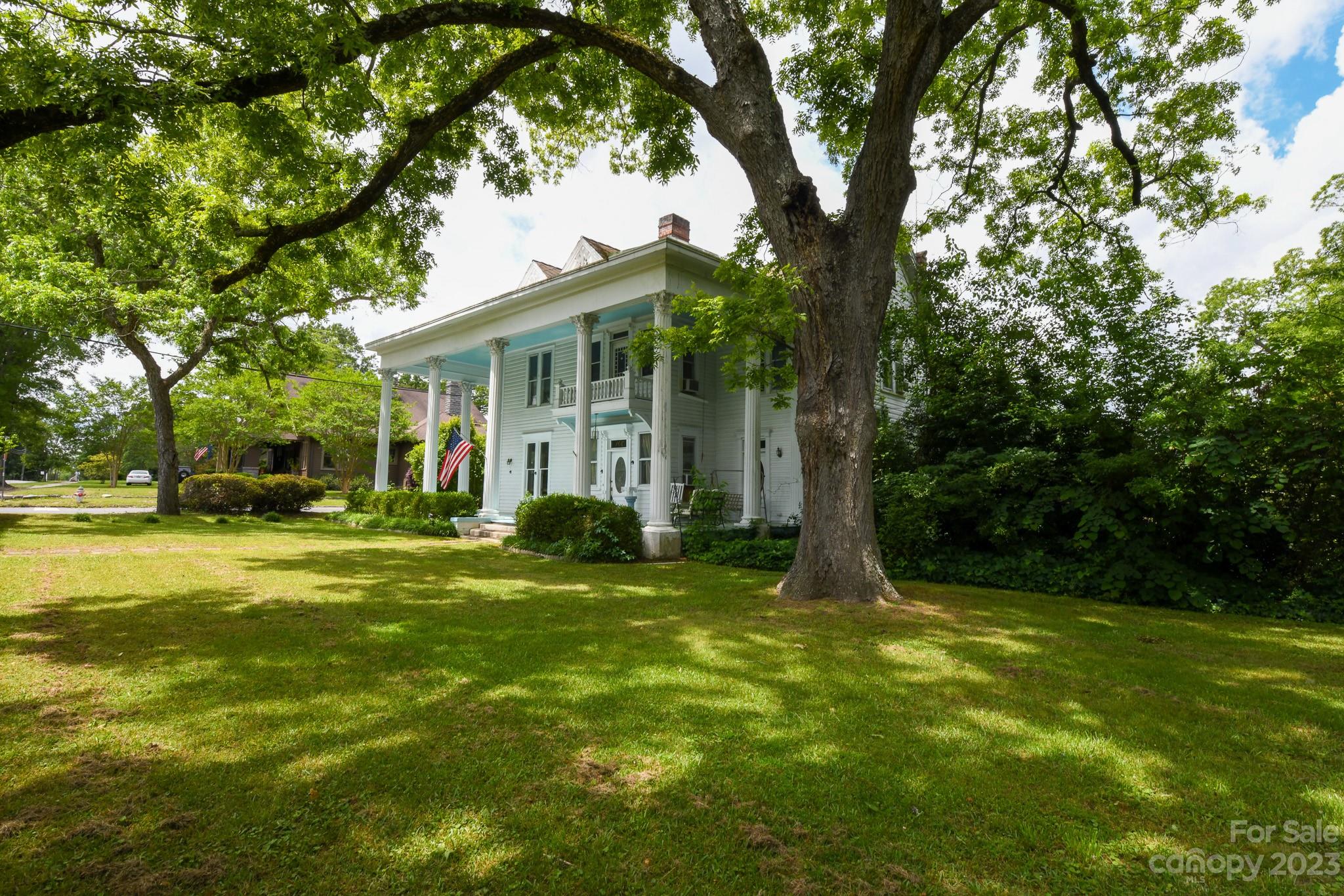 160 York Street Chester, SC 29706 - Photo 29 of 34 a view of a house with a big yard and large trees
