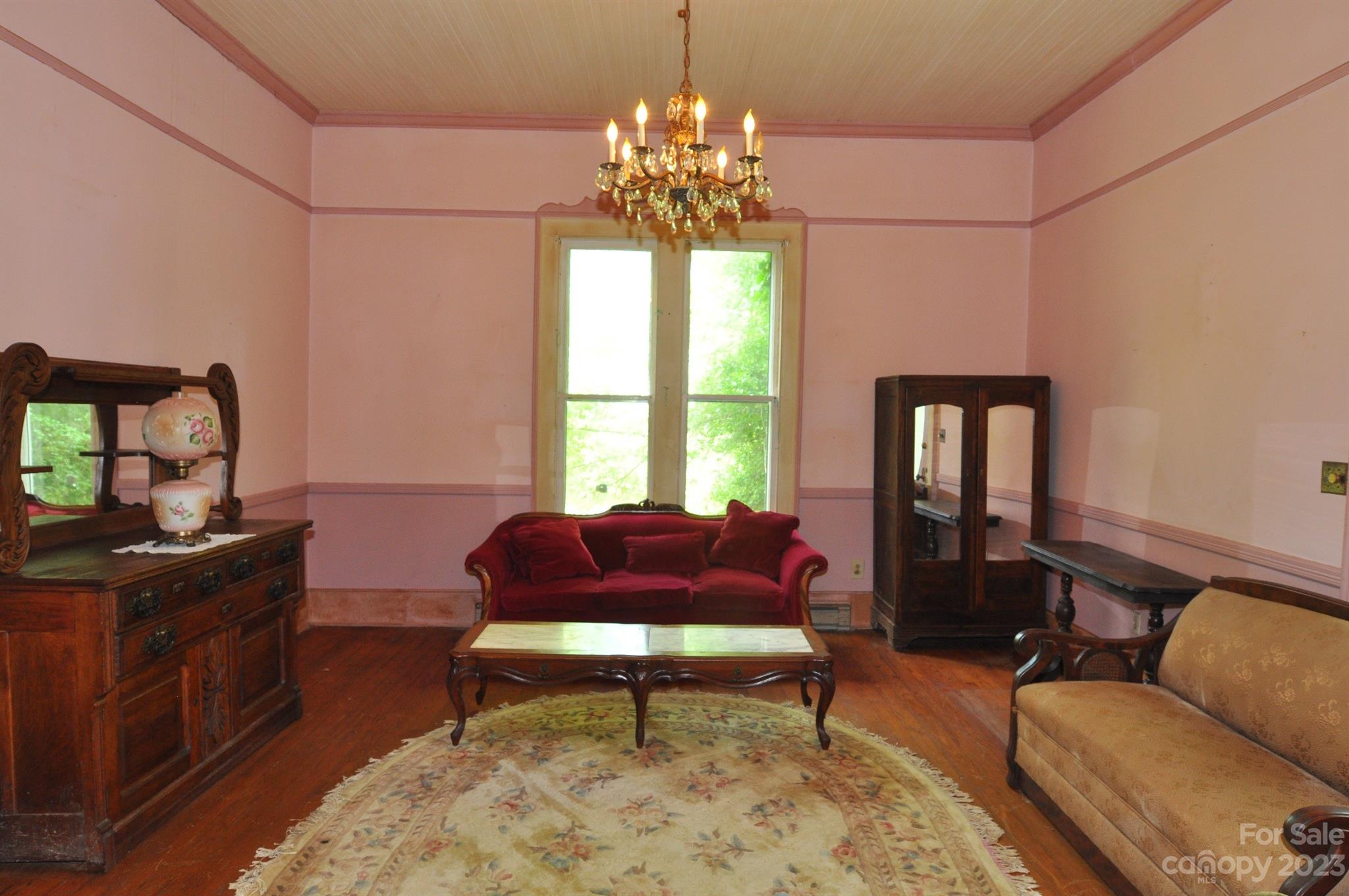 160 York Street Chester, SC 29706 - Photo 6 of 34 a living room with furniture and a chandelier