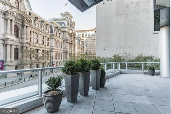 a view of building with potted plant