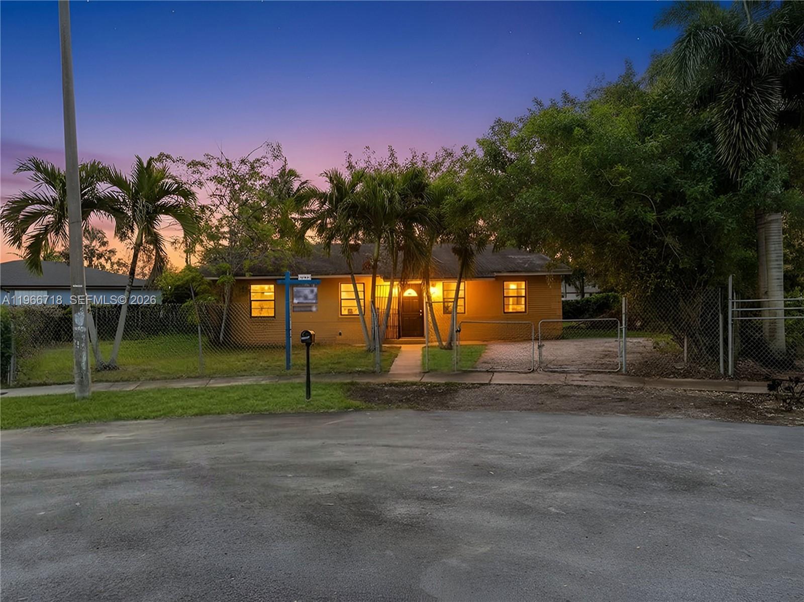 1664 Southwest 2 Court Homestead, FL 33030 - Photo 2 of 57 a view of a park that has a tree on it