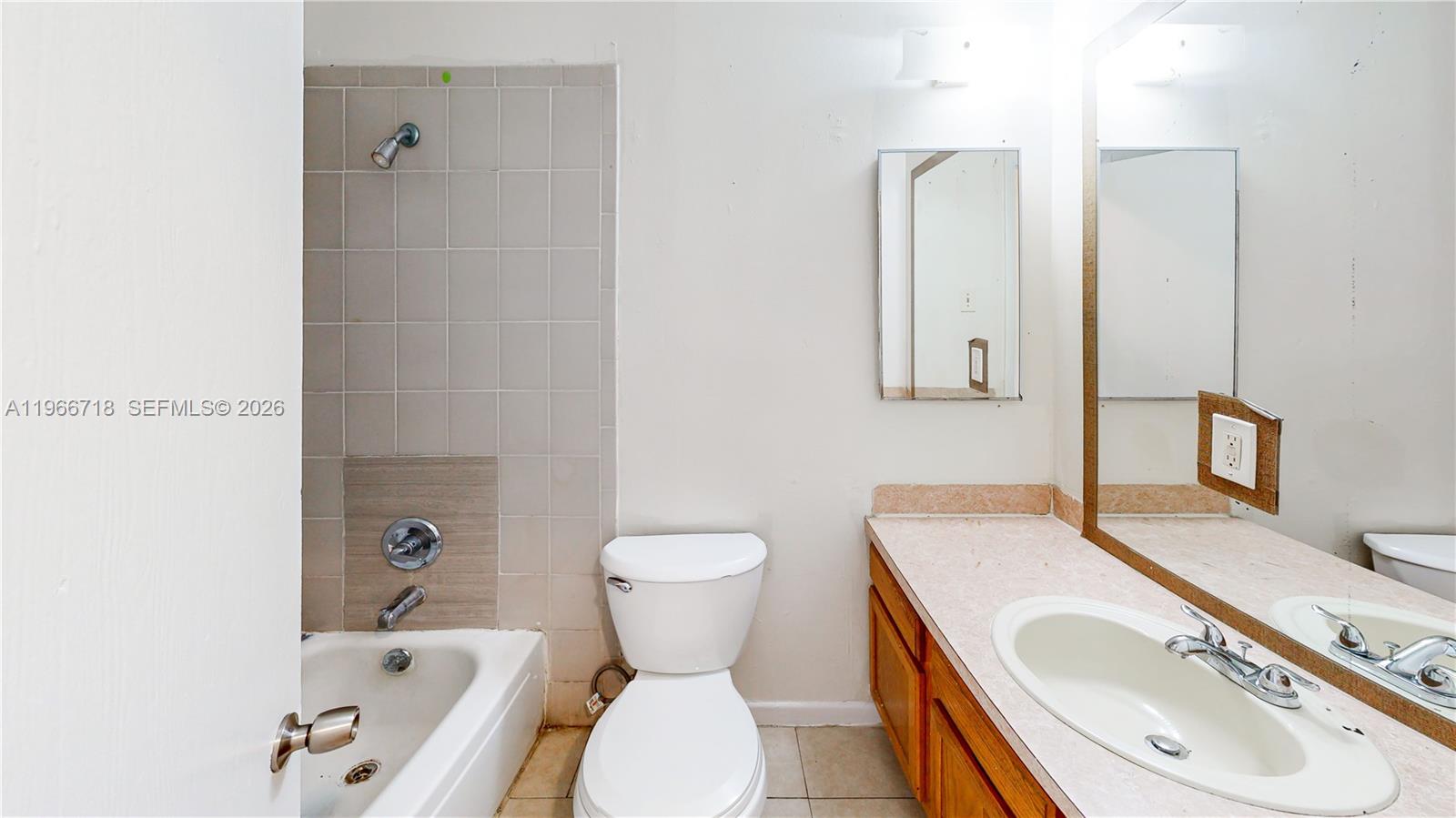1664 Southwest 2 Court Homestead, FL 33030 - Photo 28 of 57 a bathroom with a sink toilet and shower