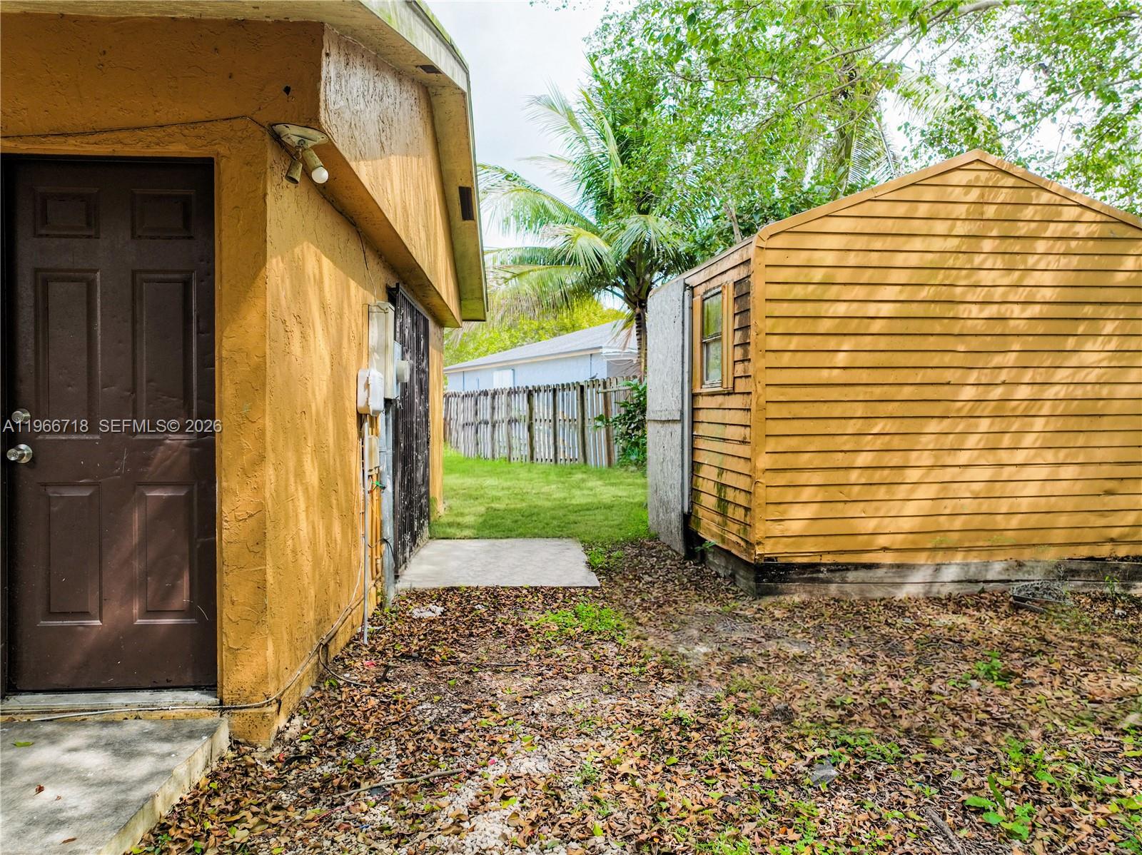 1664 Southwest 2 Court Homestead, FL 33030 - Photo 33 of 57 a view of a back yard with a house