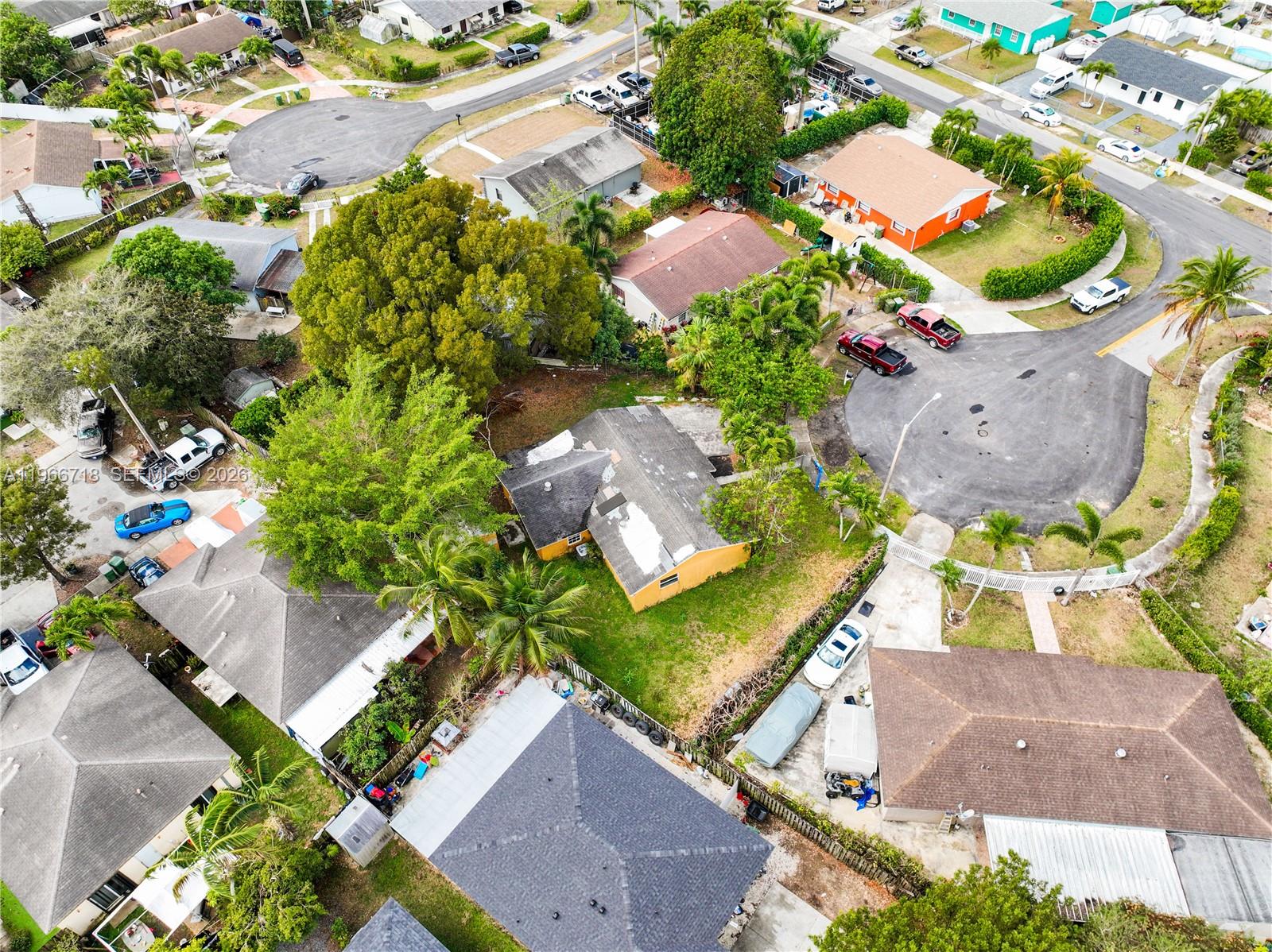 1664 Southwest 2 Court Homestead, FL 33030 - Photo 42 of 57 an aerial view of a house with a yard and garden