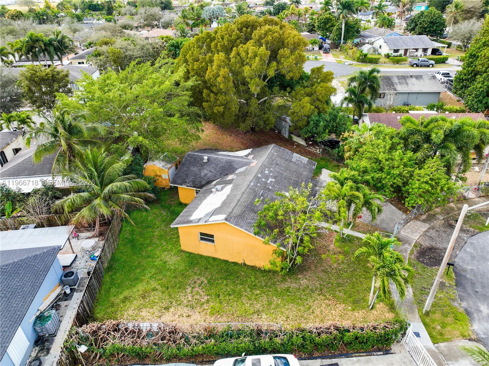 1664 Southwest 2 Court Homestead, FL 33030 - Photo 44 of 57 an aerial view of a house with a yard