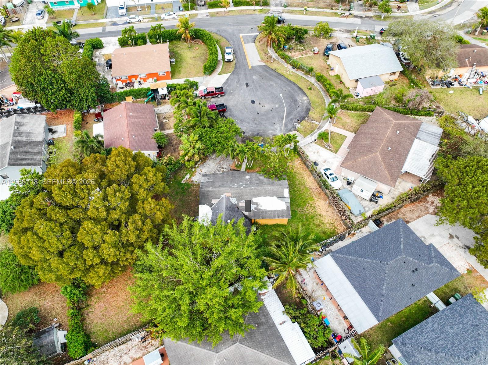 1664 Southwest 2 Court Homestead, FL 33030 - Photo 45 of 57 an aerial view of a house with a garden and plants
