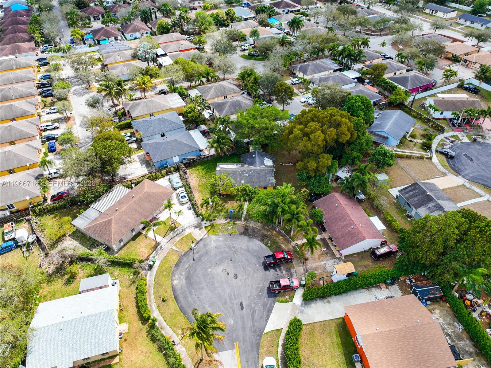1664 Southwest 2 Court Homestead, FL 33030 - Photo 47 of 57 an aerial view of residential house with outdoor space and swimming pool