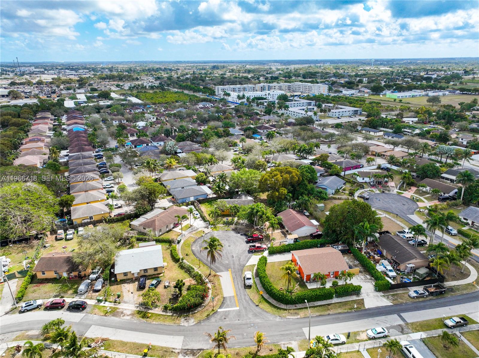 1664 Southwest 2 Court Homestead, FL 33030 - Photo 51 of 57 an aerial view of residential houses with outdoor space