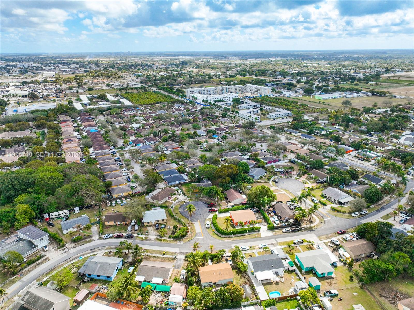 1664 Southwest 2 Court Homestead, FL 33030 - Photo 54 of 57 an aerial view of residential houses with outdoor space