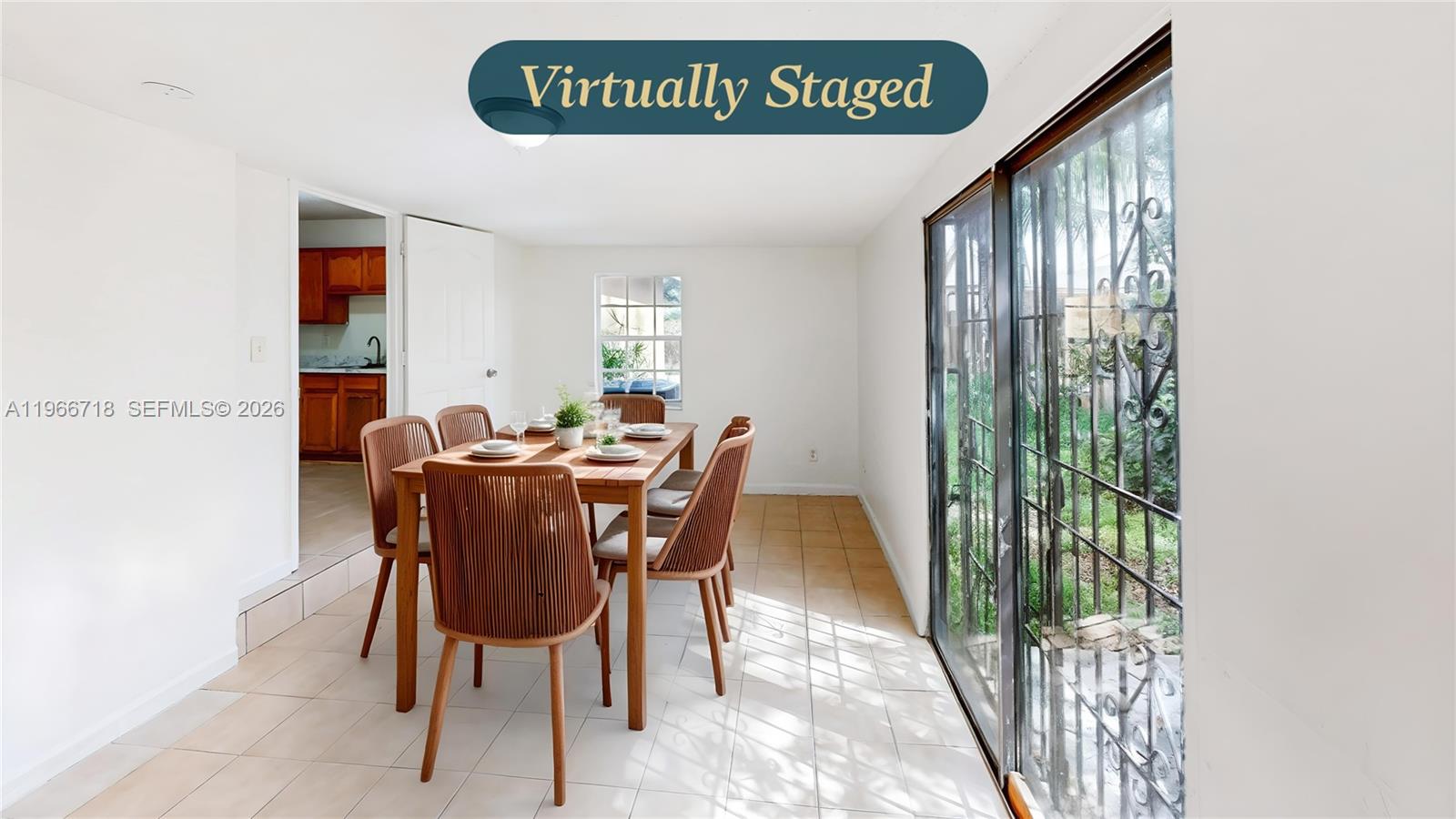 1664 Southwest 2 Court Homestead, FL 33030 - Photo 8 of 57 a view of a dining room with furniture and a window