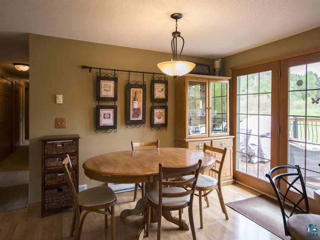 4310 Vermilion Road Duluth, MN 55803 - Photo 5 of 24 Patio Doors lead to your sun-filled deck!
