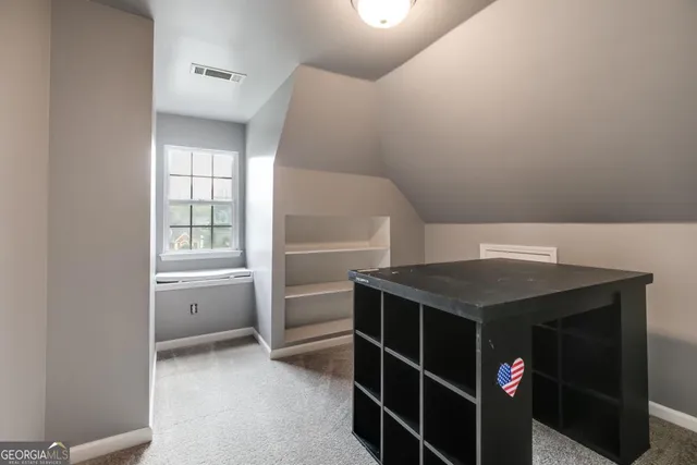 a room with storage and utility