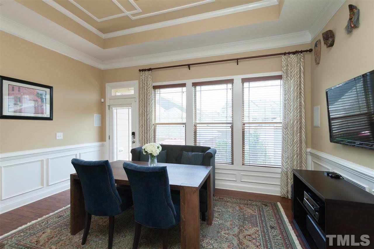 1410 Van Page Boulevard Raleigh, NC 27607 - Photo 11 of 25 a view of a dining room with furniture window and outside view