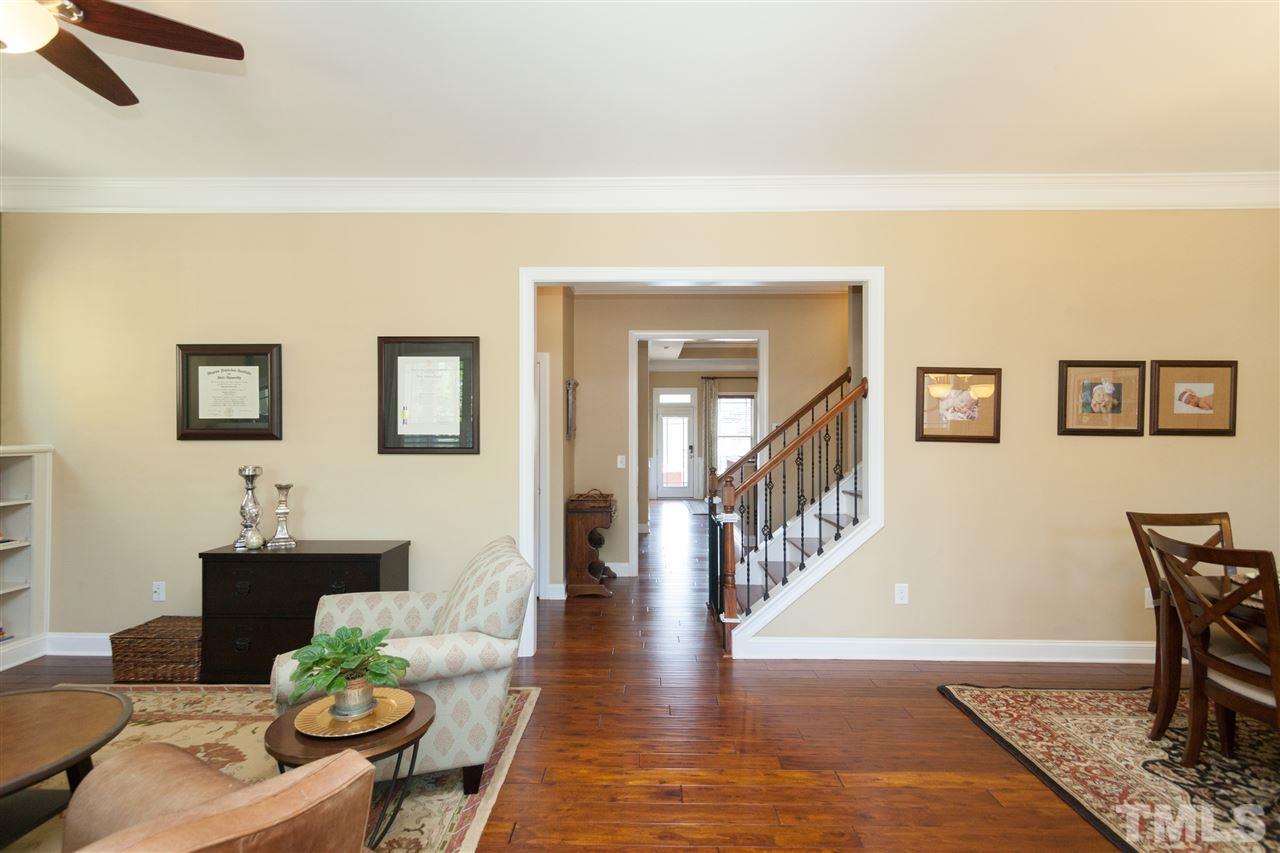 1410 Van Page Boulevard Raleigh, NC 27607 - Photo 4 of 25 a living room with furniture and wooden floor