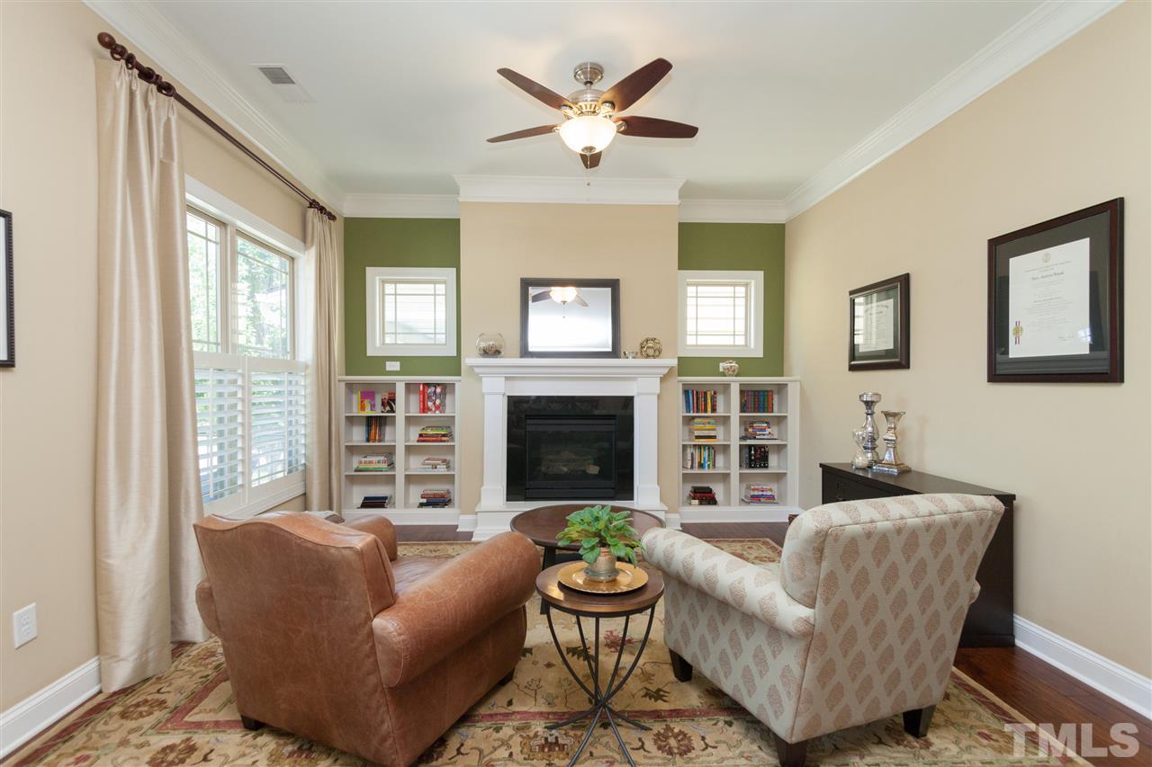 1410 Van Page Boulevard Raleigh, NC 27607 - Photo 5 of 25 a living room with furniture and a large window