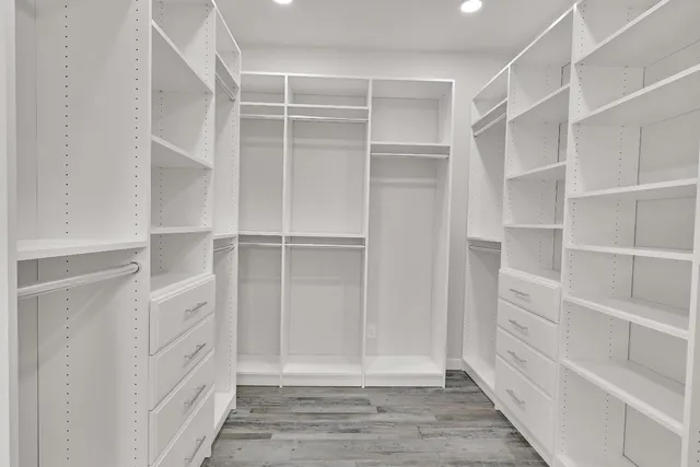 a bathroom with a shower and a sink