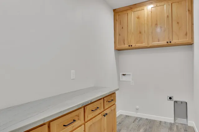 a view of storage and utility room with washer and dryer