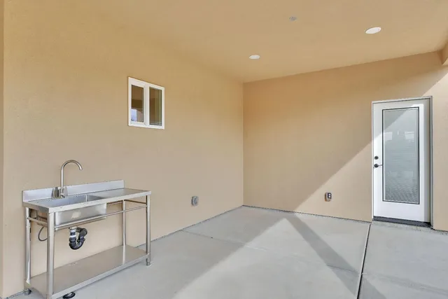 a big house with a big yard and large trees