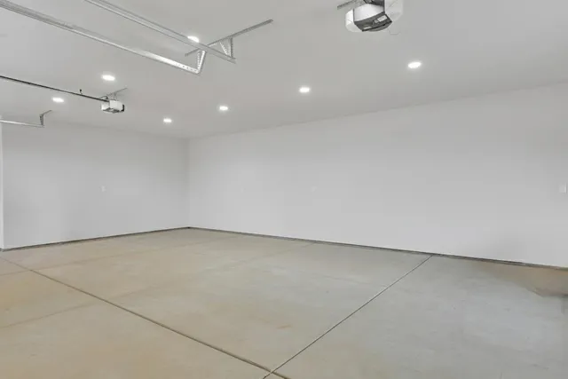 a view of a backyard with barn and green space