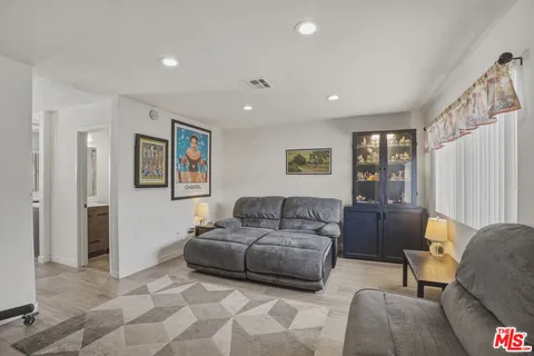 a living room with furniture and a couch