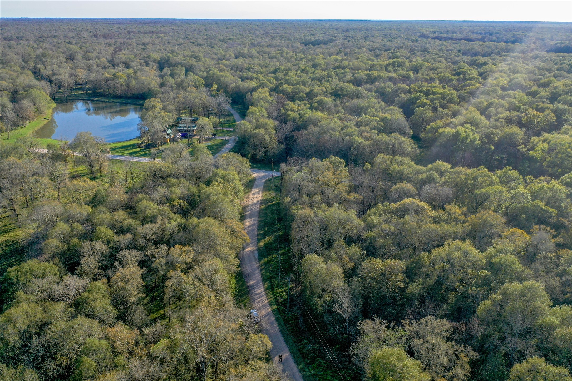 212 Carpenter Drive Cleveland, TX 77327 - Photo 12 of 23 an aerial view of houses with yard