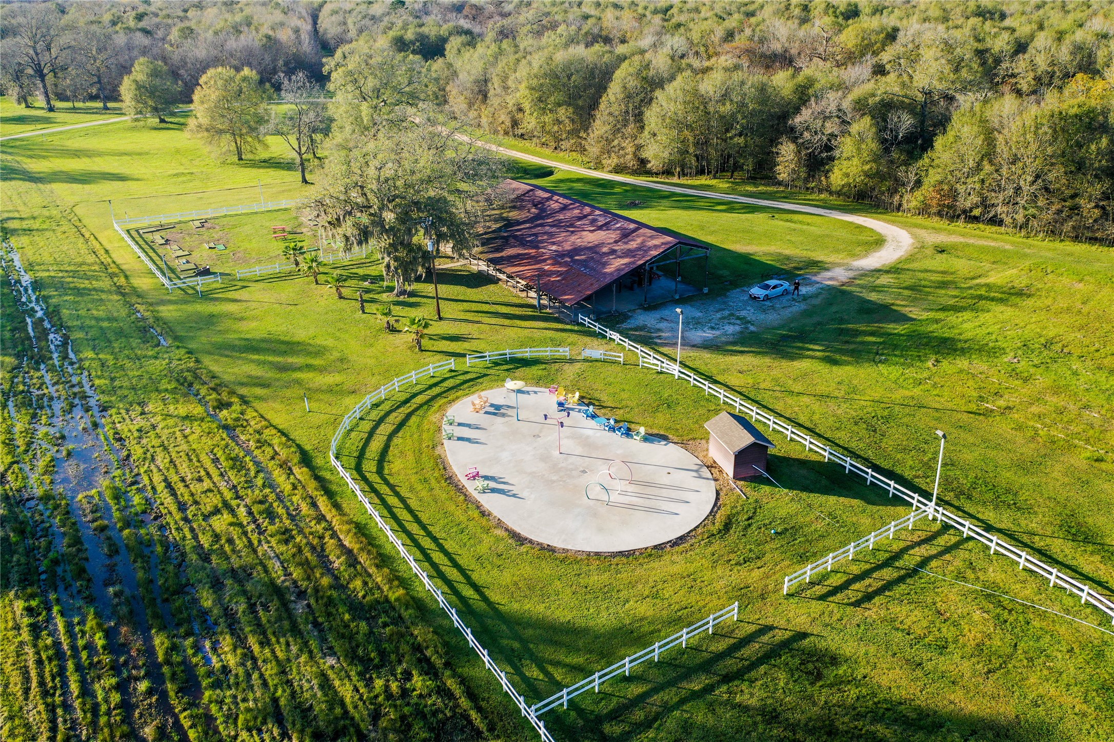 212 Carpenter Drive Cleveland, TX 77327 - Photo 17 of 23 a view of an outdoor space and a lake view