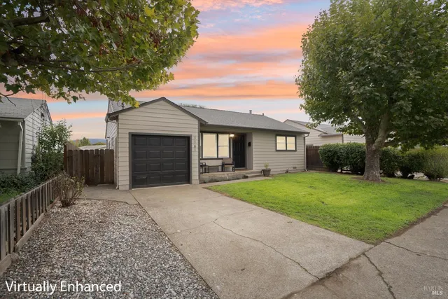 front view of a house with a yard