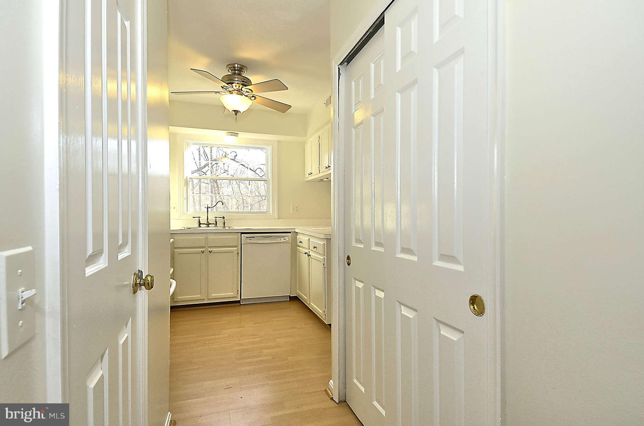 333 Crescendo Way Silver Spring, MD 20901 - Photo 12 of 30 Hall View to Kitchen