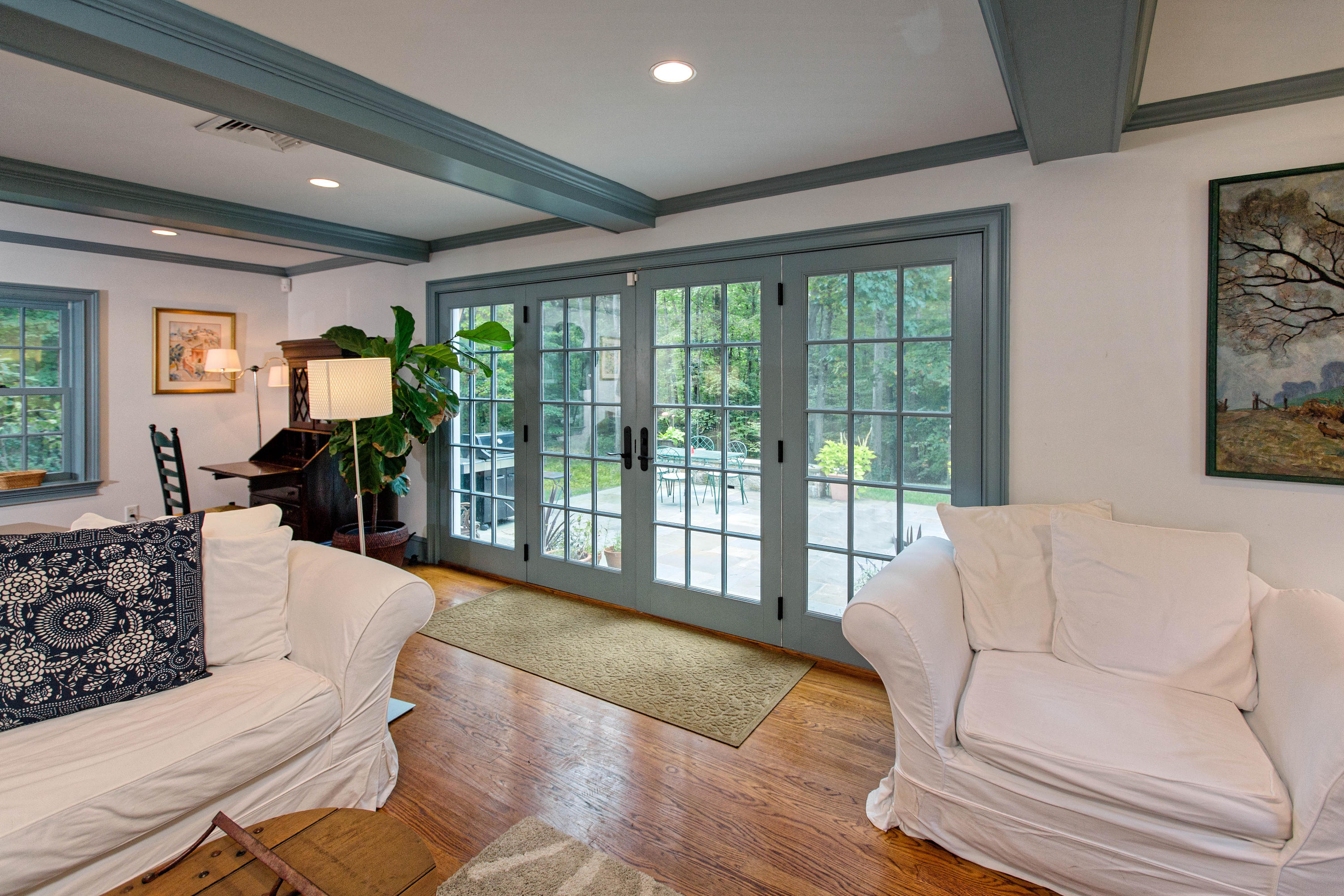 292 Briscoe Road New Canaan, CT 06840 - Photo 19 of 45 a living room with furniture and a large window