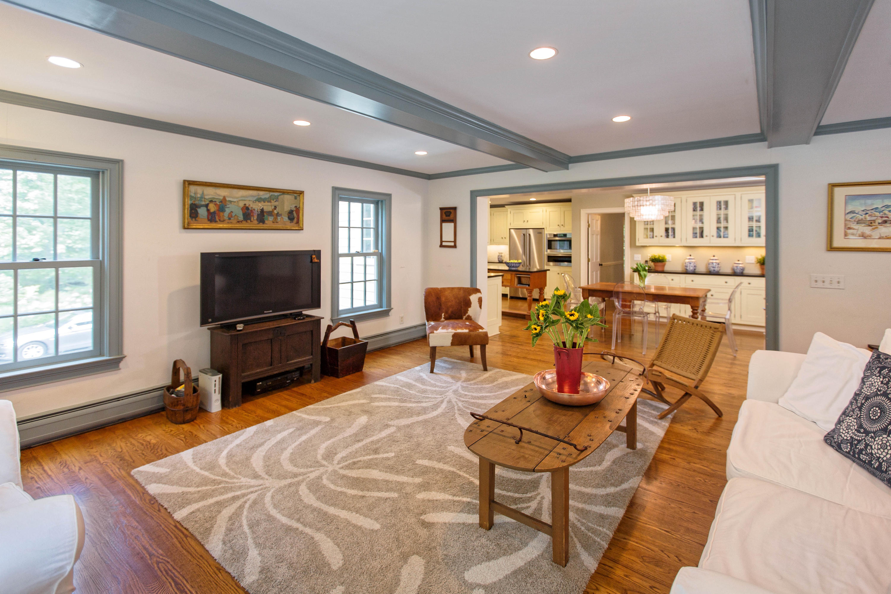 292 Briscoe Road New Canaan, CT 06840 - Photo 20 of 45 a living room with furniture and a flat screen tv