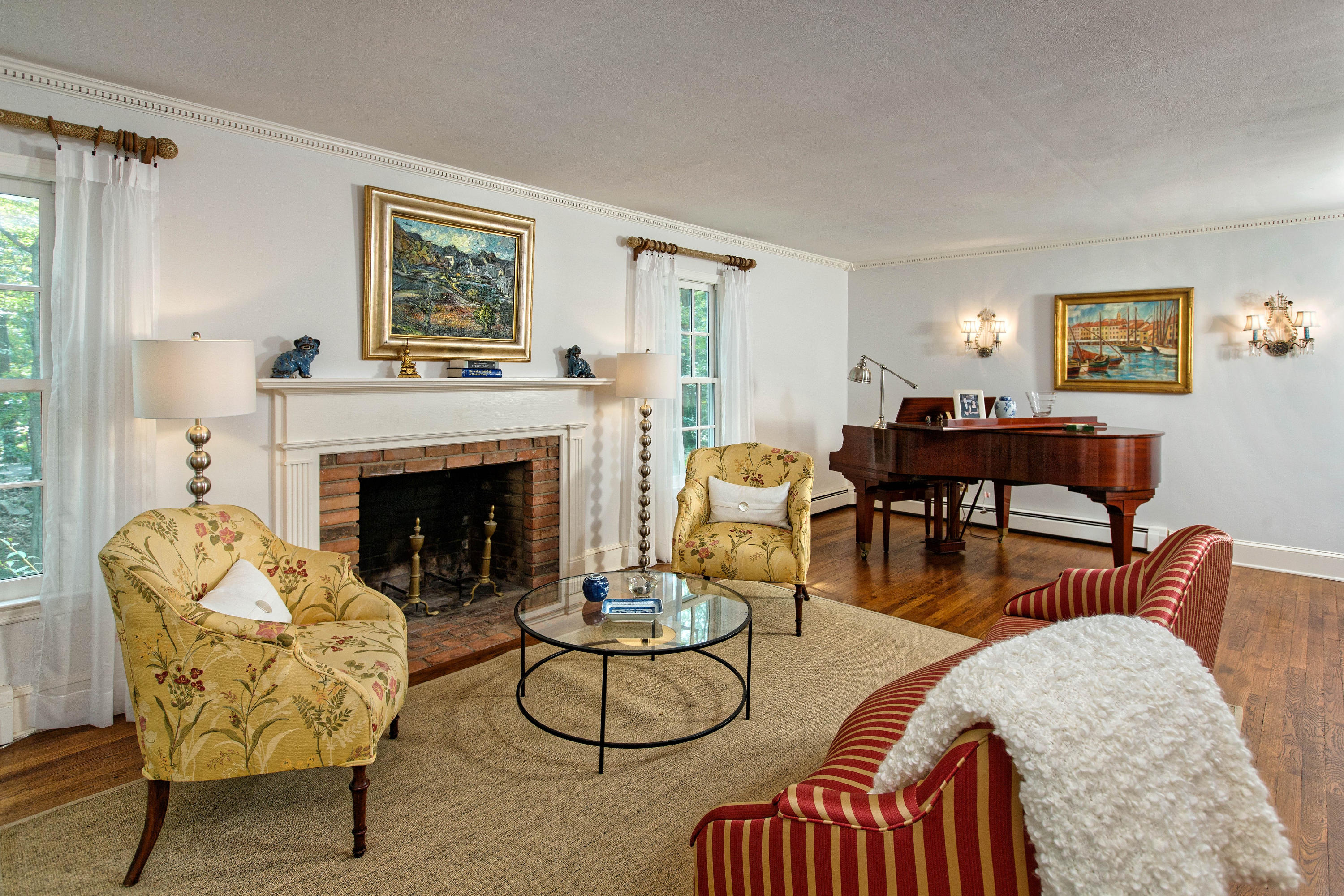 292 Briscoe Road New Canaan, CT 06840 - Photo 27 of 45 a living room with furniture and a fireplace