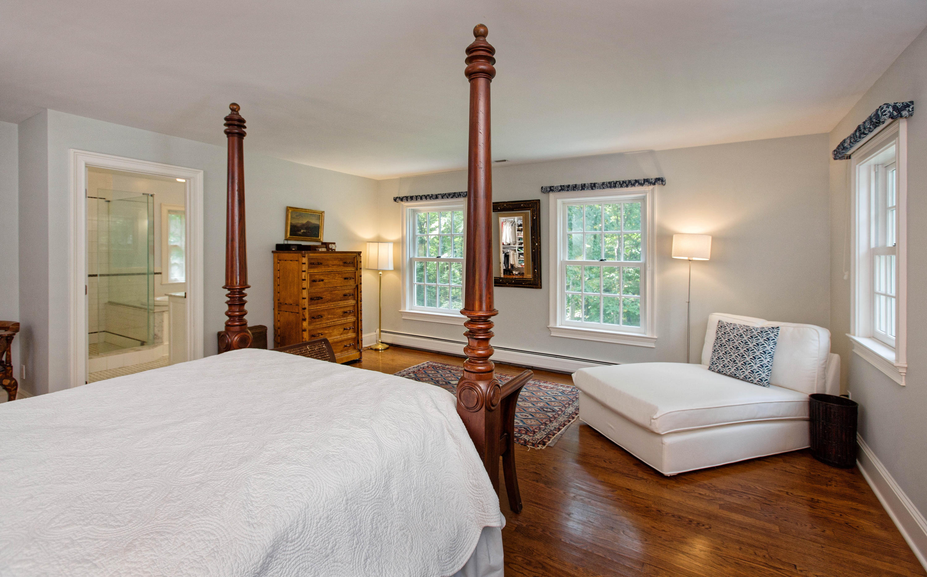 292 Briscoe Road New Canaan, CT 06840 - Photo 31 of 45 a bedroom with a bed and a dresser next to a window