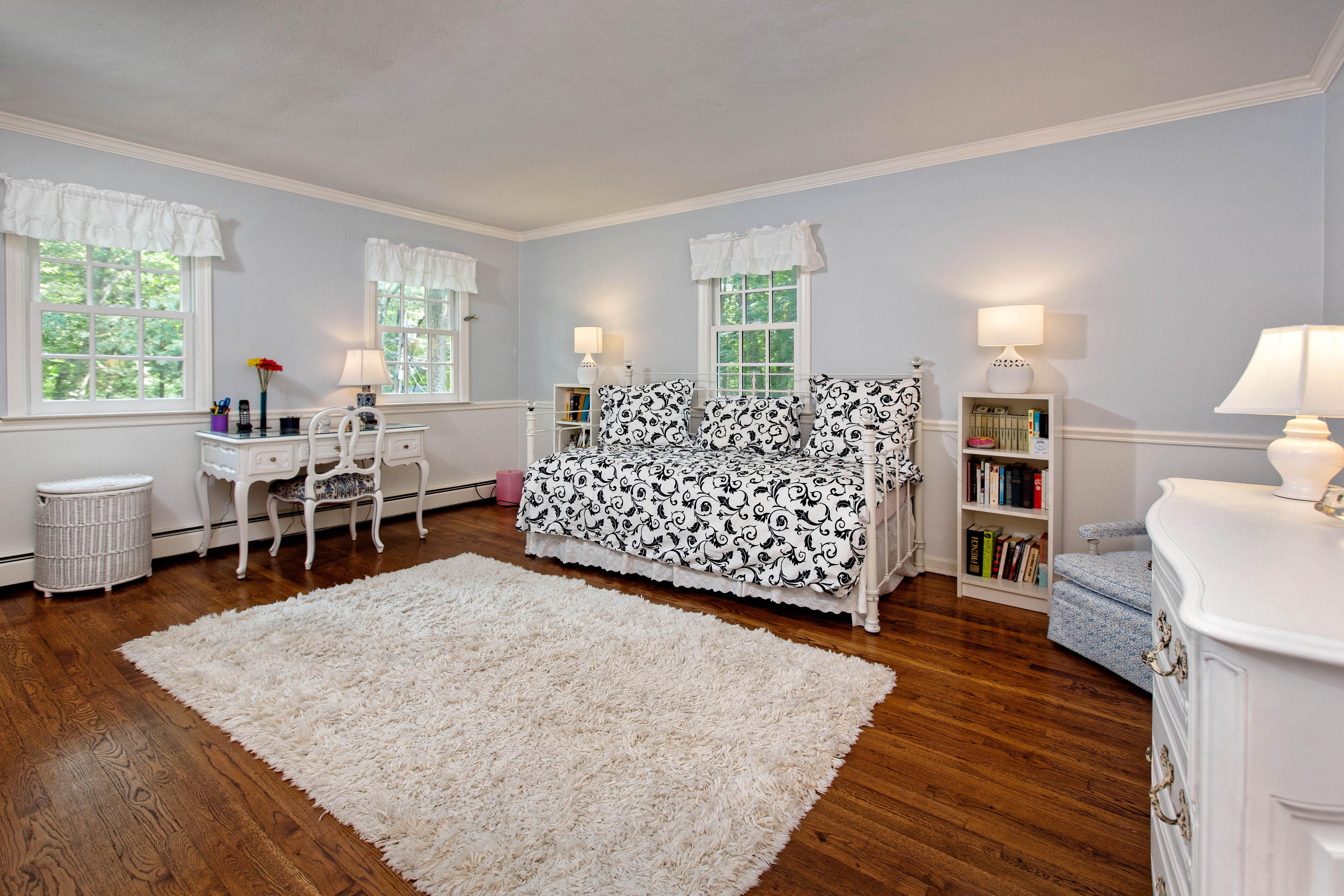 292 Briscoe Road New Canaan, CT 06840 - Photo 38 of 45 a living room with furniture and a wooden floor