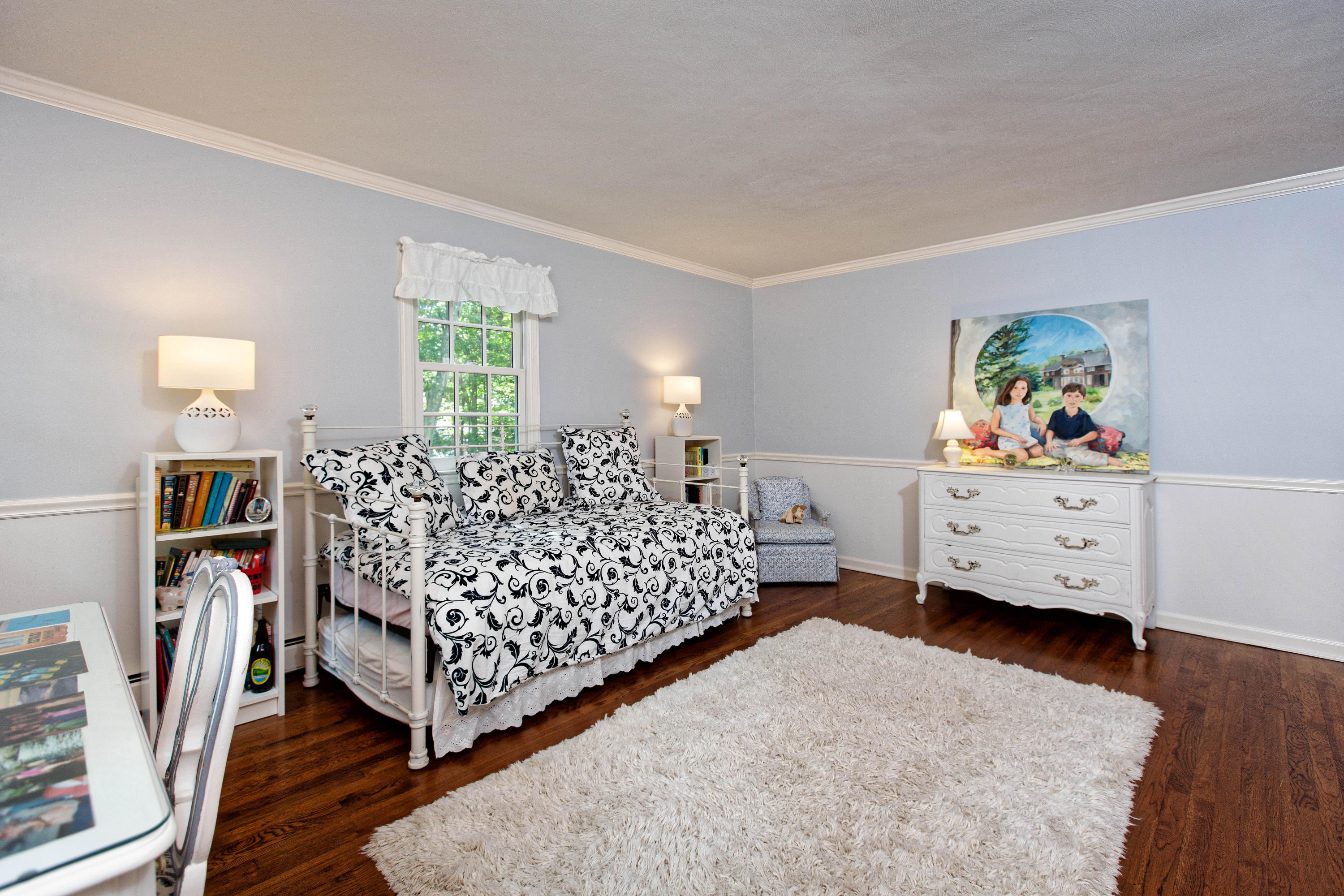 292 Briscoe Road New Canaan, CT 06840 - Photo 39 of 45 a bed room with a bed and a baby crib
