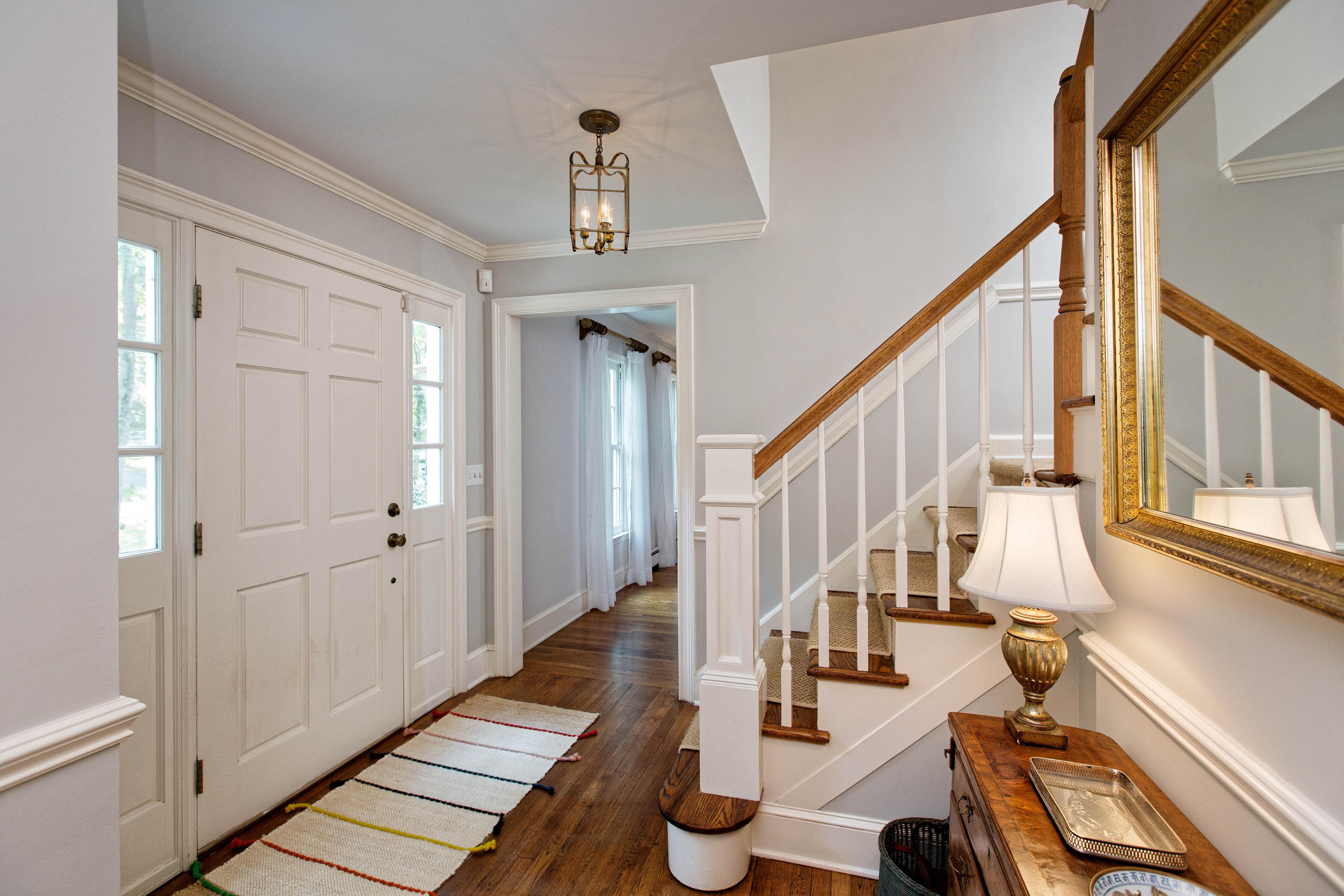 292 Briscoe Road New Canaan, CT 06840 - Photo 5 of 45 a view of entryway and hall with wooden floor