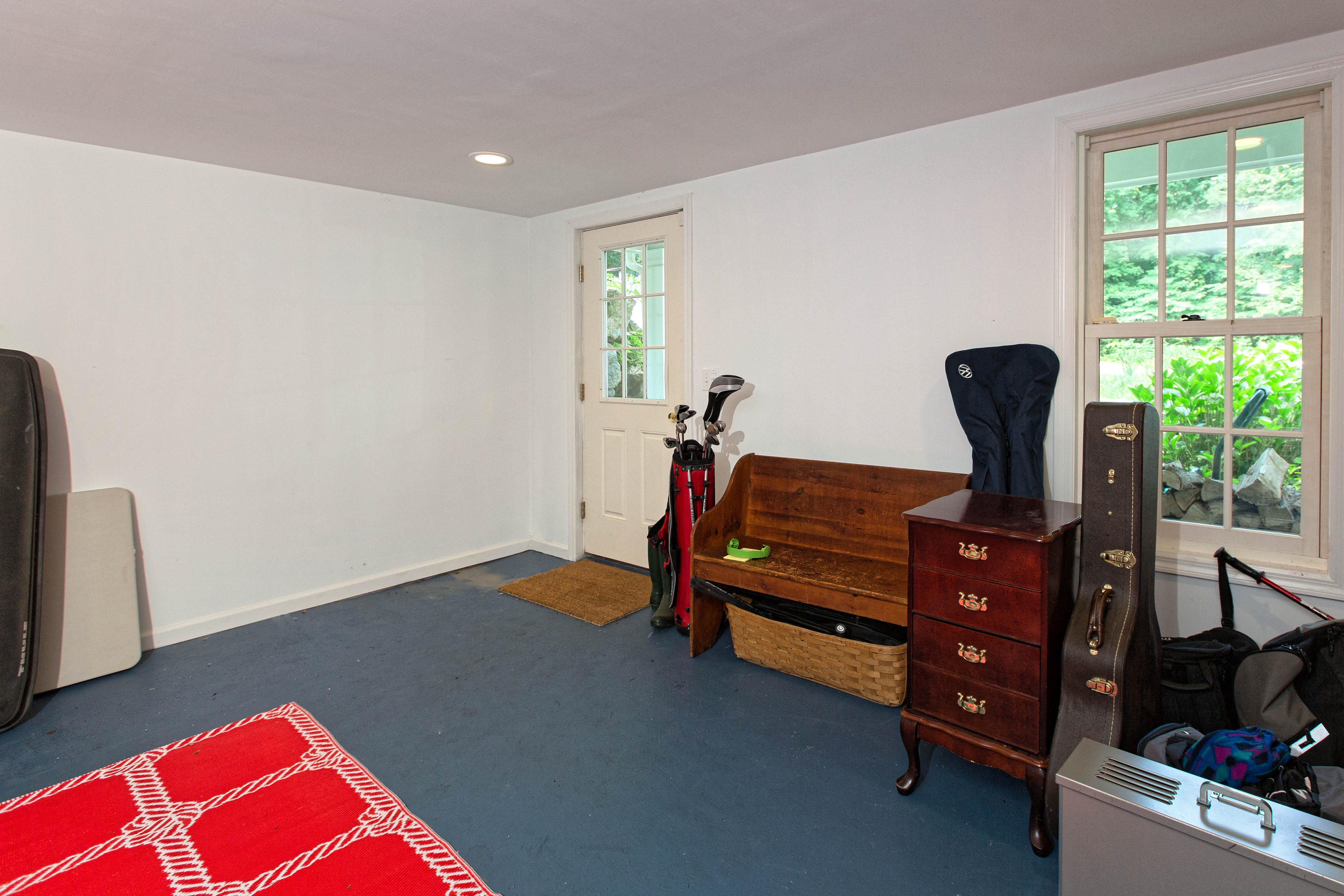292 Briscoe Road New Canaan, CT 06840 - Photo 42 of 45 a room with furniture and a window